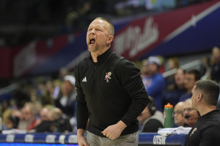 Louisville ranked again with a new coach and roster overhauled by winning transfers